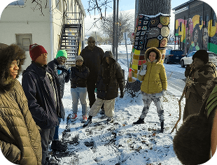 People laughing, standing on snow